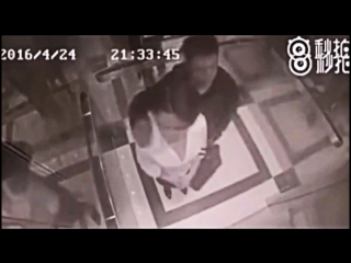 the girl clearly beats the guy in the elevator cool video